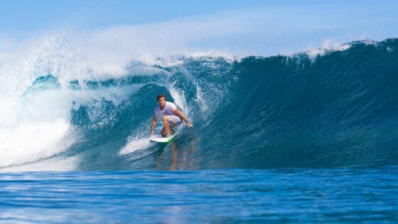 Surfer Riding Wave